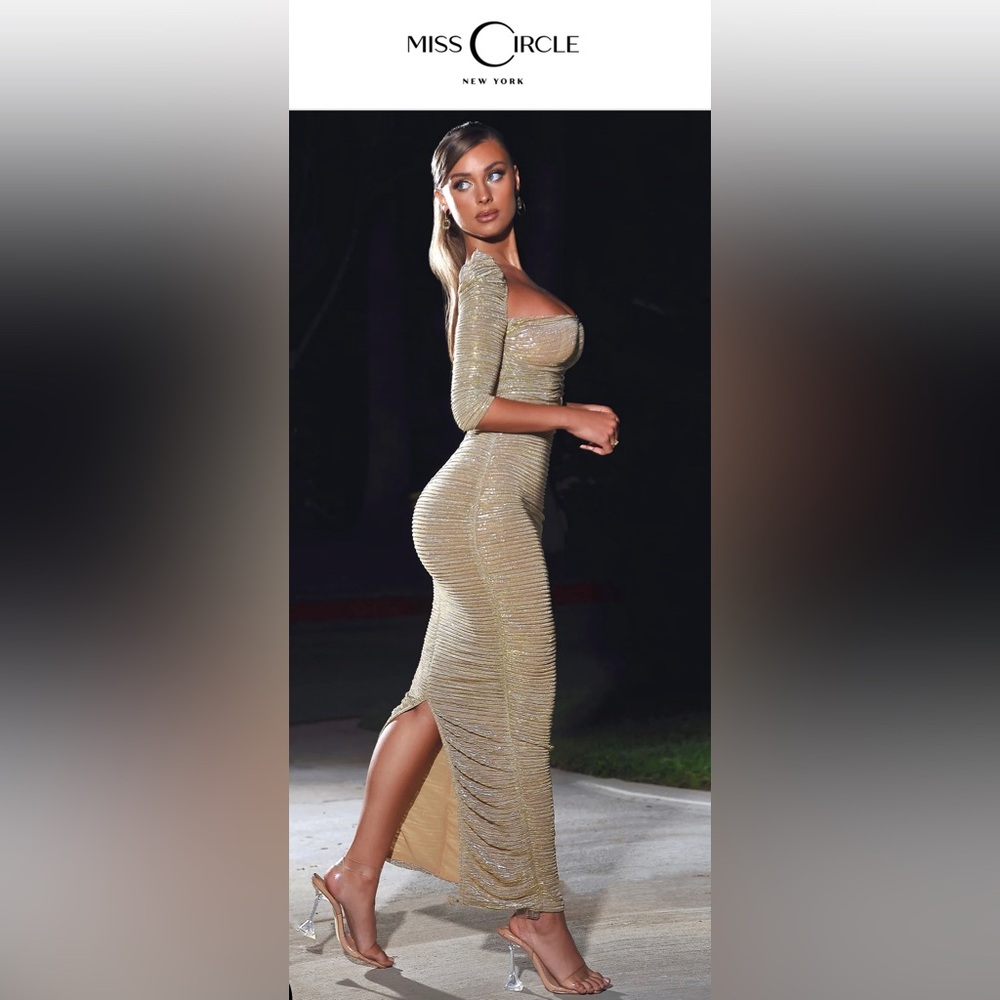 Miss Circle New York size large Beautiful gold gown hides every flaw .